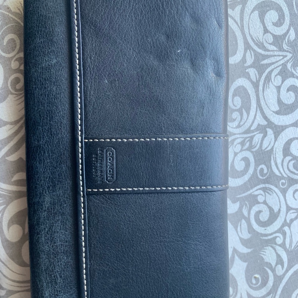 Coach bill fold wallet.  Heavily used